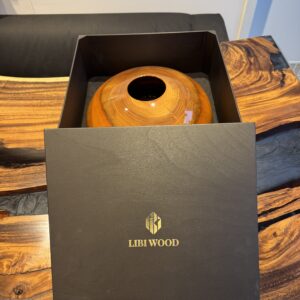 Walnut vase with a natural core