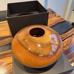 Walnut vase with a natural core