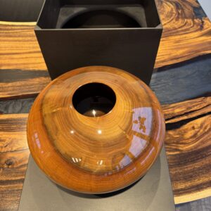 Walnut vase with a natural core