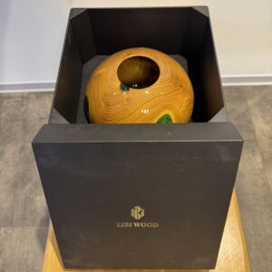 Wooden bowl with emerald green resin