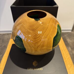 Wooden bowl with emerald green resin